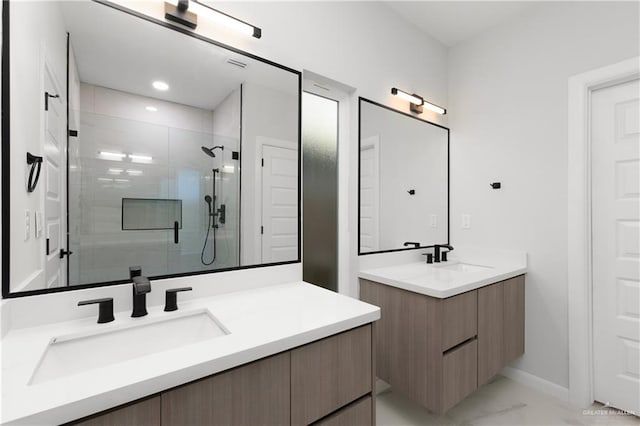 bathroom featuring vanity and walk in shower