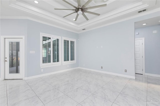 220 Stella Dr, San Juan, TX 78589 - empty room featuring a raised ceiling, visible vents, crown molding, and a ceiling fan