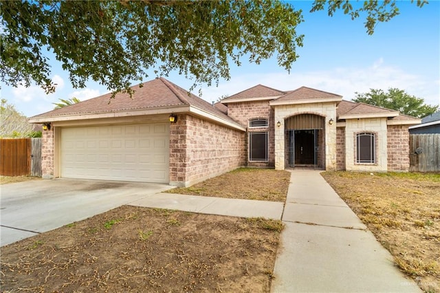 single story home featuring a garage