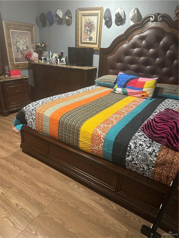 bedroom featuring light hardwood / wood-style flooring