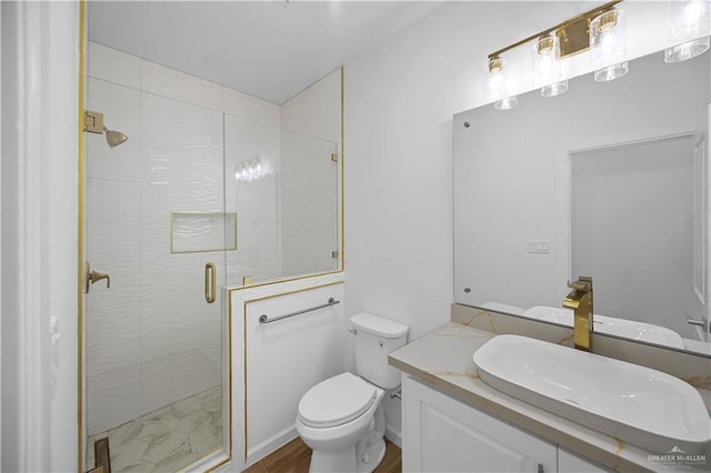 556 Demi St, Edinburg, TX 78542 - bathroom with a stall shower, vanity, and toilet
