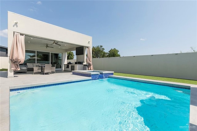 view of swimming pool with fence, a pool with connected hot tub, ceiling fan, an outdoor living space, and a patio area