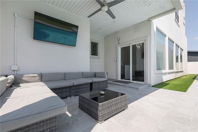 view of patio with ceiling fan and outdoor lounge area