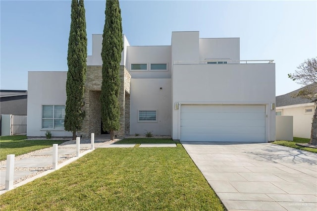 contemporary house featuring a front lawn, stucco siding, driveway, and fence