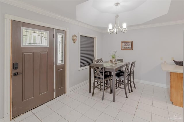 dining room featuring crown molding, baseboards, light tile patterned flooring, and a chandelier
