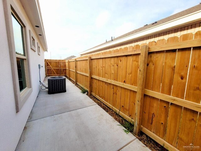 view of patio featuring central air condition unit