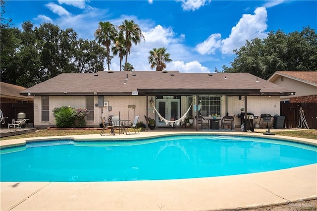 6800 N 15th Ln, Mcallen, TX 78504 - view of pool featuring a patio, french doors, and a grill