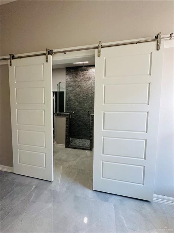 interior space featuring a shower with door