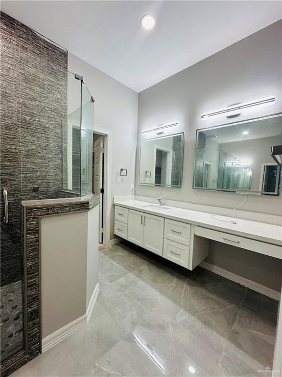 bathroom with vanity and walk in shower