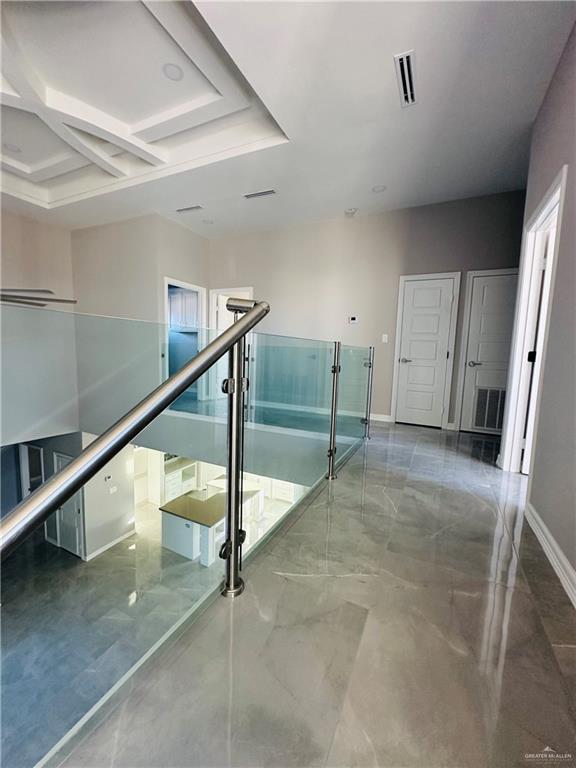 hallway with coffered ceiling