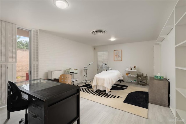 bedroom featuring light hardwood / wood-style flooring