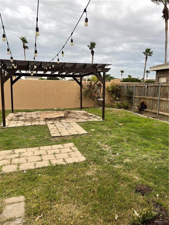 view of yard featuring a pergola and a patio area