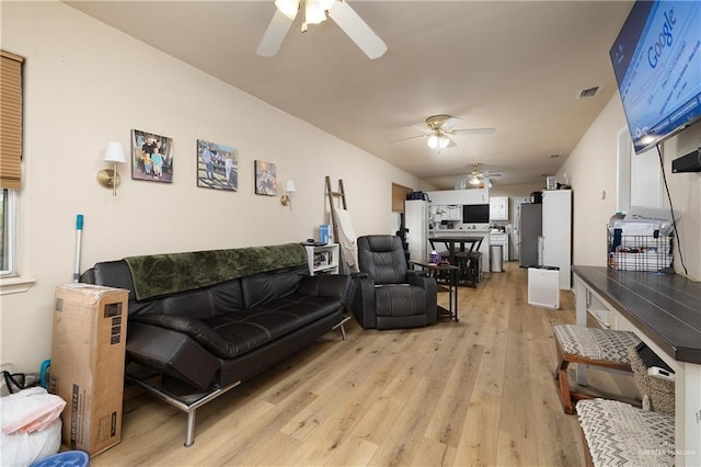 912 Bentsen Rd, Mcallen, TX 78501 - living room featuring ceiling fan and light wood finished floors