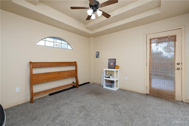 912 Bentsen Rd, Mcallen, TX 78501 - bedroom with a raised ceiling, carpet, access to exterior, and baseboards
