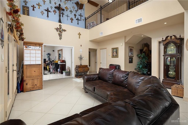 912 Bentsen Rd, Mcallen, TX 78501 - tiled living area with a high ceiling and a ceiling fan