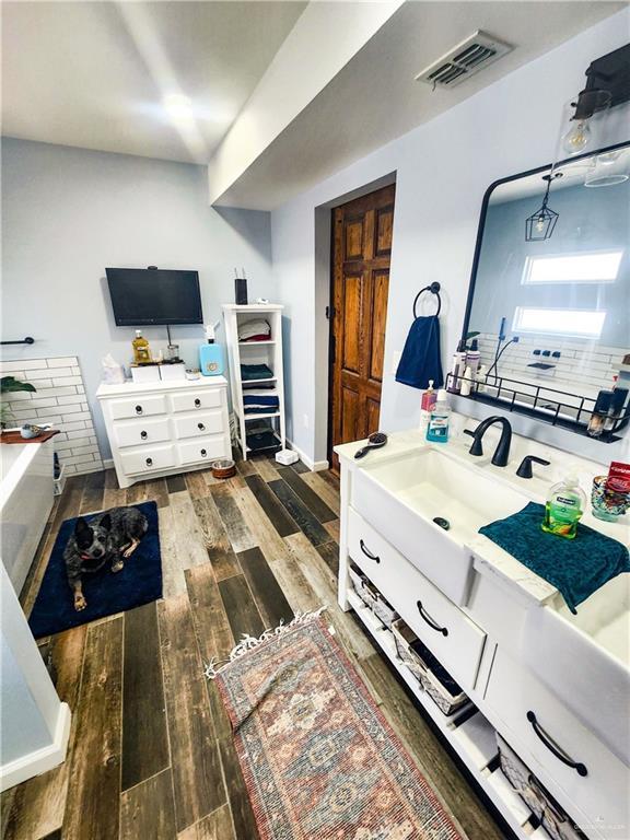 1405 S Brier St, Alton, TX 78573 - bedroom with wood finished floors