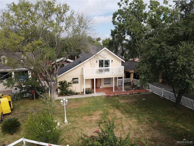 1405 S Brier St, Alton, TX 78573 - view of front of house featuring a fenced backyard, a wooden deck, and a patio area