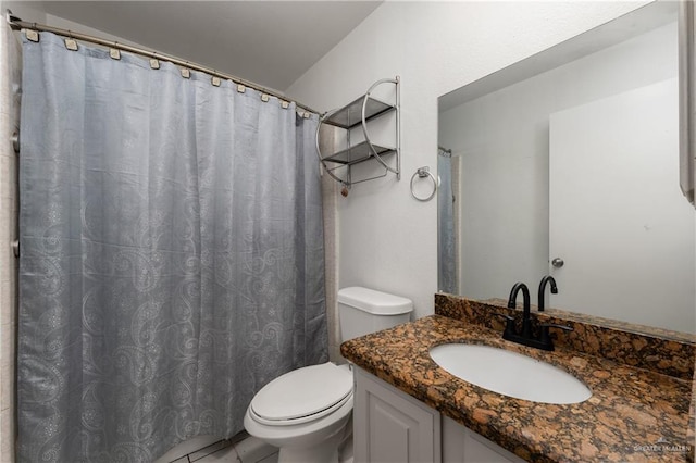 bathroom with vanity, toilet, and a shower with shower curtain