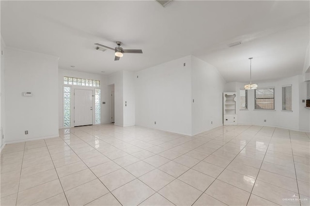 unfurnished living room featuring ceiling fan and light tile patterned flooring