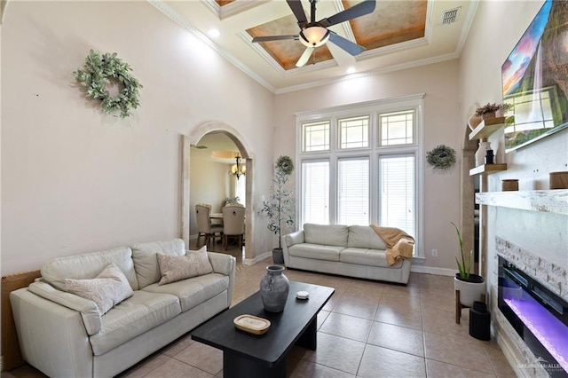 2112 Saginaw Ave, Edinburg, TX 78541 - living room with a high ceiling, ceiling fan, coffered ceiling, arched walkways, and light tile patterned flooring