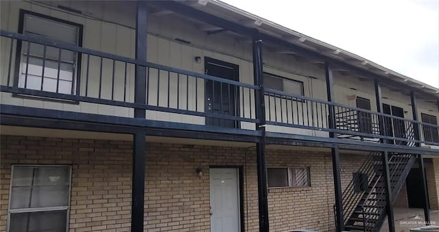 1600 Bridge Ave Unit 207, Weslaco, TX 78596 - view of property featuring stairs
