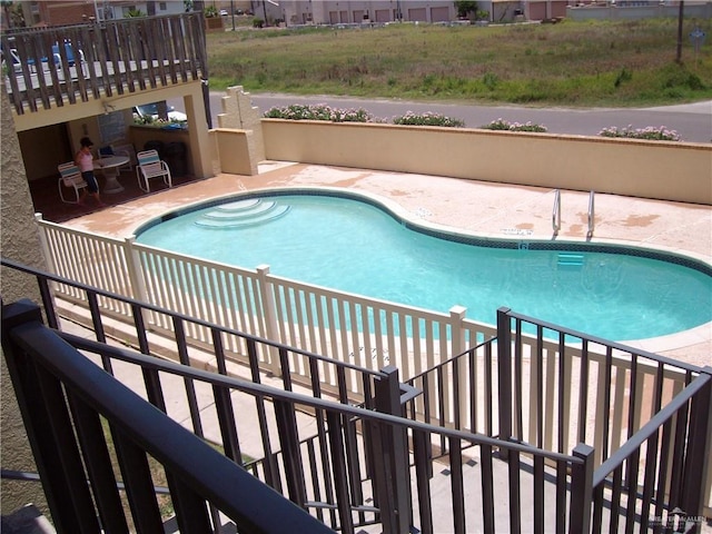 view of pool with a patio