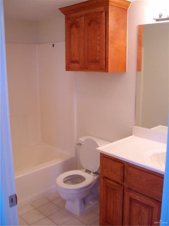 full bathroom with shower / tub combination, tile patterned flooring, vanity, and toilet