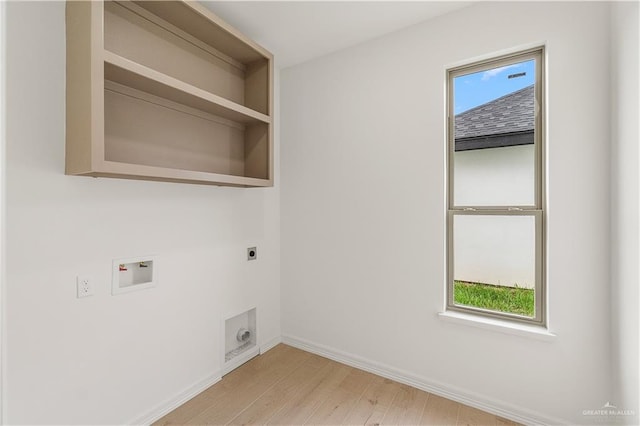 laundry room featuring electric dryer hookup, washer hookup, and light hardwood / wood-style flooring