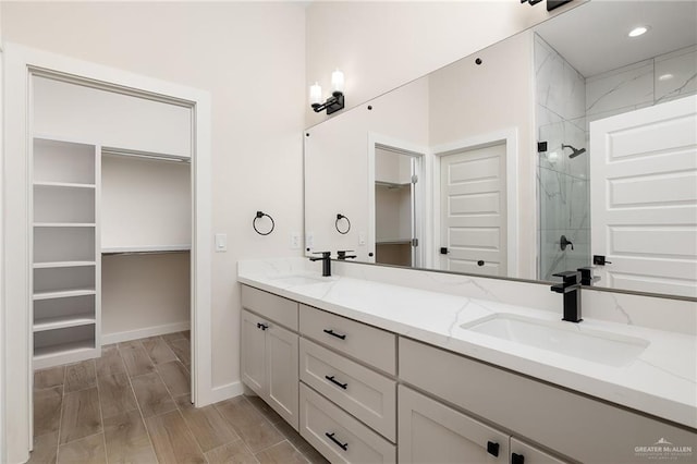 bathroom featuring vanity and walk in shower