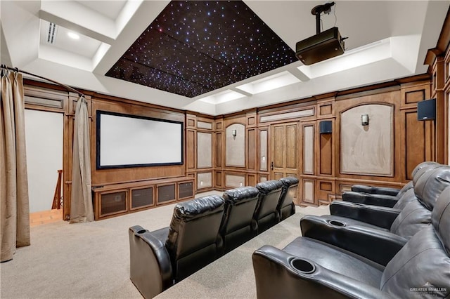 home theater with a decorative wall, wooden walls, coffered ceiling, and carpet