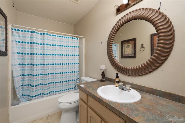 full bathroom with shower / tub combo with curtain, vanity, tile patterned flooring, and toilet