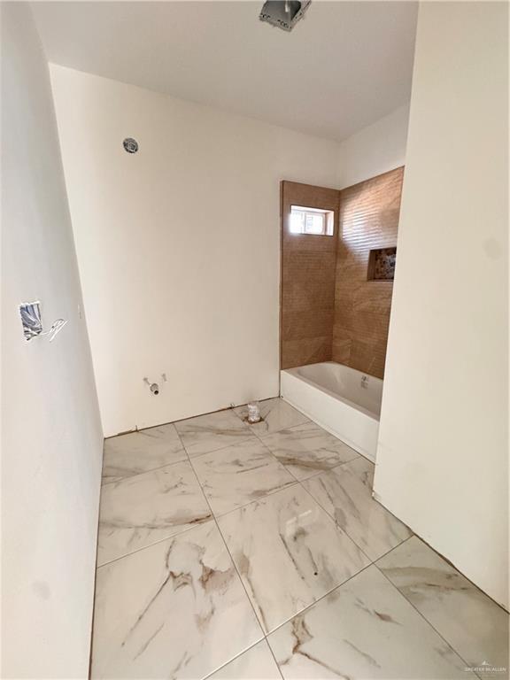 bathroom featuring tub / shower combination