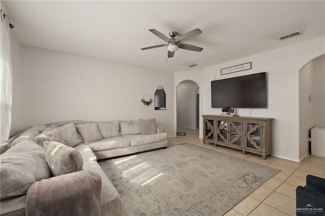 3517 Prestwick St, Edinburg, TX 78542 - tiled living room featuring arched walkways and ceiling fan
