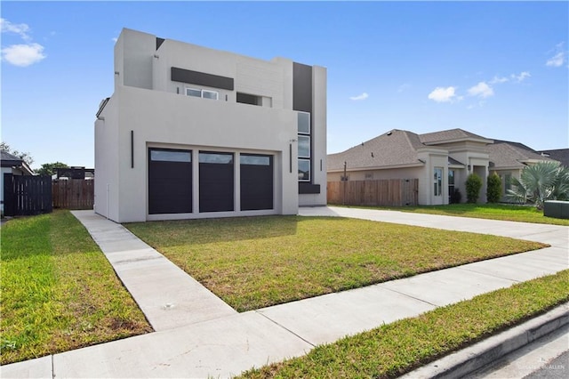 contemporary home featuring a front lawn