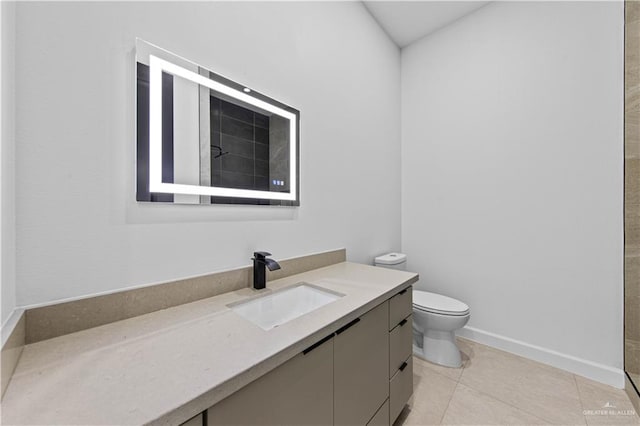 bathroom featuring tile patterned flooring, vanity, a shower, and toilet