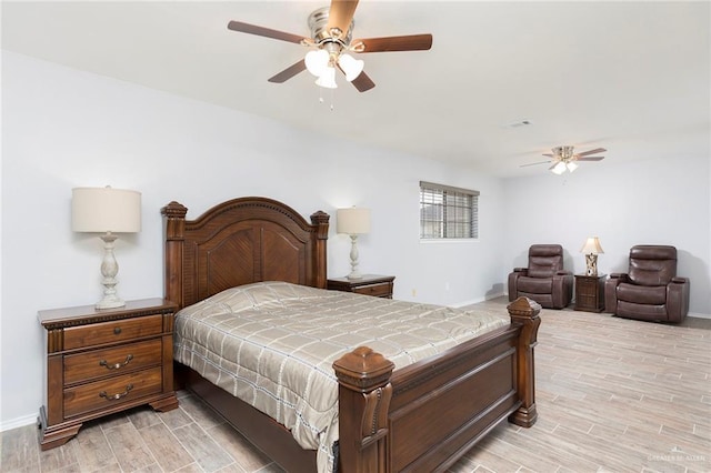 1815 Wilson St, Mission, TX 78572 - bedroom with light wood finished floors and a ceiling fan