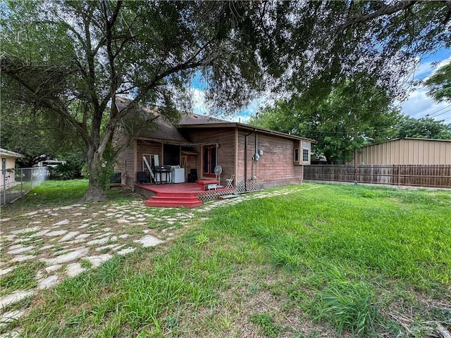 13307 Ash Ave, Edinburg, TX 78542 - back of property with a wooden deck