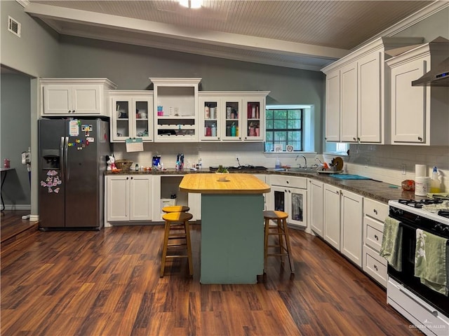 13307 Ash Ave, Edinburg, TX 78542 - kitchen featuring stainless steel refrigerator with ice dispenser, wood counters, white gas stove, and decorative backsplash