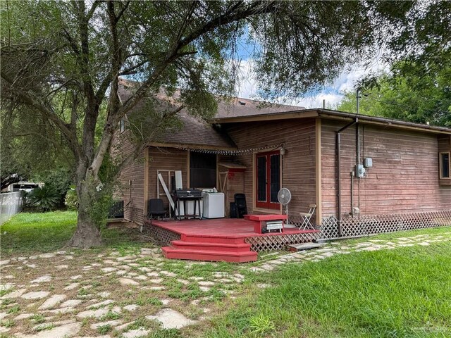 13307 Ash Ave, Edinburg, TX 78542 - back of property featuring a deck and a lawn