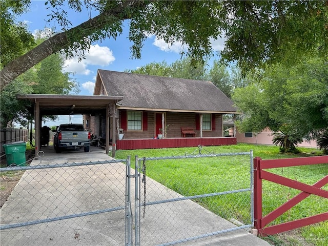 13307 Ash Ave, Edinburg, TX 78542 - view of front of house with a porch, a gate, concrete driveway, an attached carport, and a shingled roof