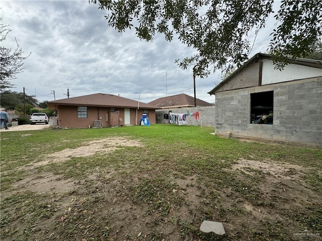 view of yard featuring central AC