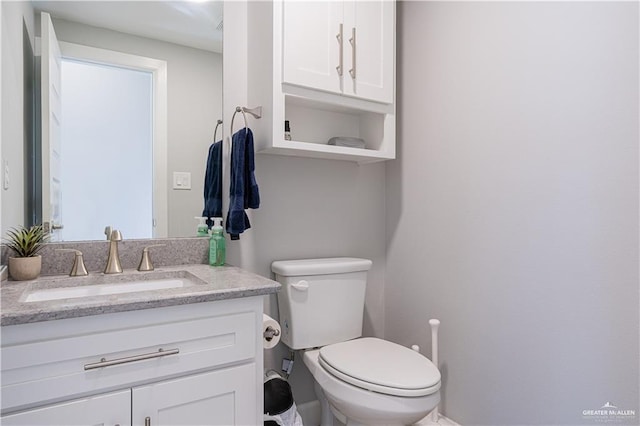 6907 N 11th Ln, Mcallen, TX 78504 - half bathroom featuring toilet and vanity