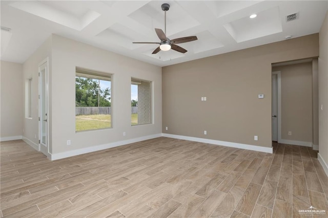 unfurnished room with ceiling fan, beam ceiling, light wood-type flooring, and coffered ceiling