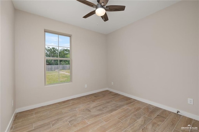 empty room featuring light hardwood / wood-style flooring and ceiling fan