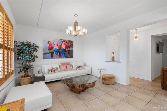 tiled living room featuring a chandelier