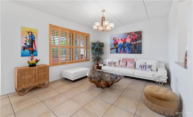 living room with tile patterned flooring and a notable chandelier