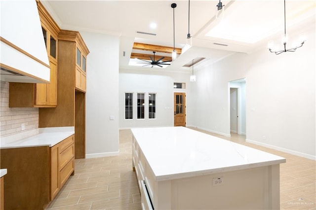 1808 Diplomat Dr, Edinburg, TX 78542 - kitchen with glass insert cabinets, ceiling fan, open floor plan, and pendant lighting