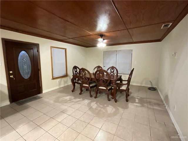 dining room featuring visible vents, baseboards, and light tile patterned floors