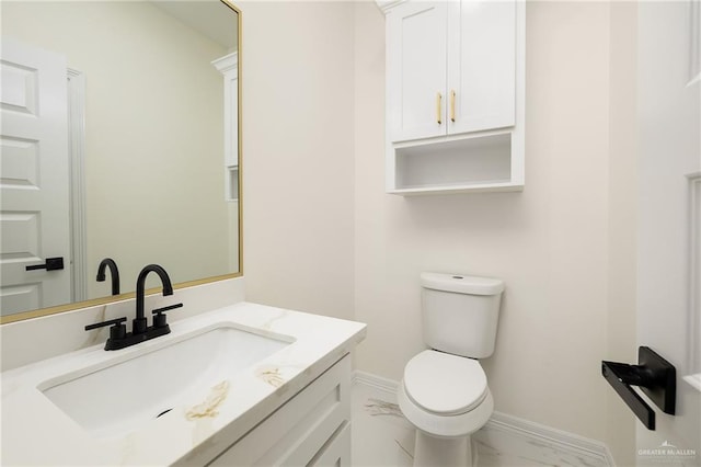 2809 E Tamarindo Ave, Hidalgo, TX 78557 - bathroom featuring marble look tiles and vanity