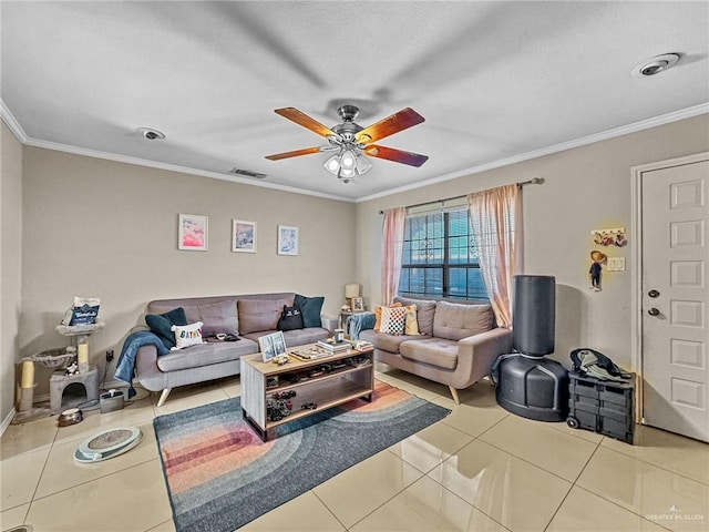 tiled living room featuring ceiling fan and crown molding